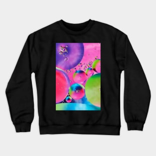 Colorful close up of oil drops in water Crewneck Sweatshirt